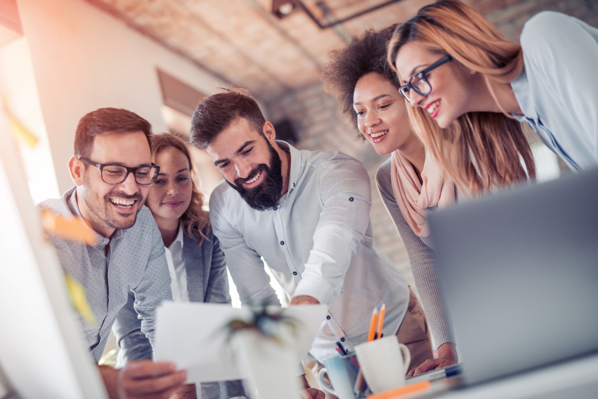 Teamgeist und Zusammenarbeit bei First Media